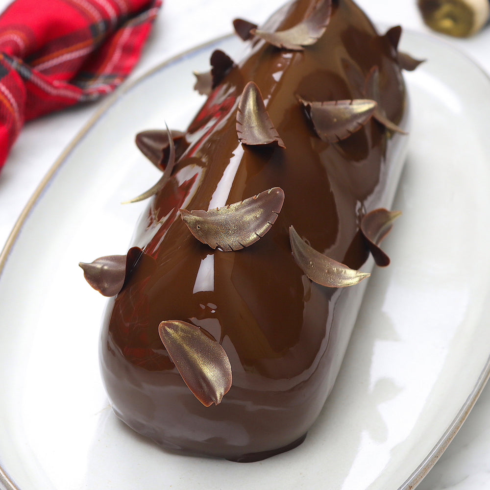 
            
                Load image into Gallery viewer, Chocolate Christmas Yule Log Recipe | How To Cuisine
            
        
